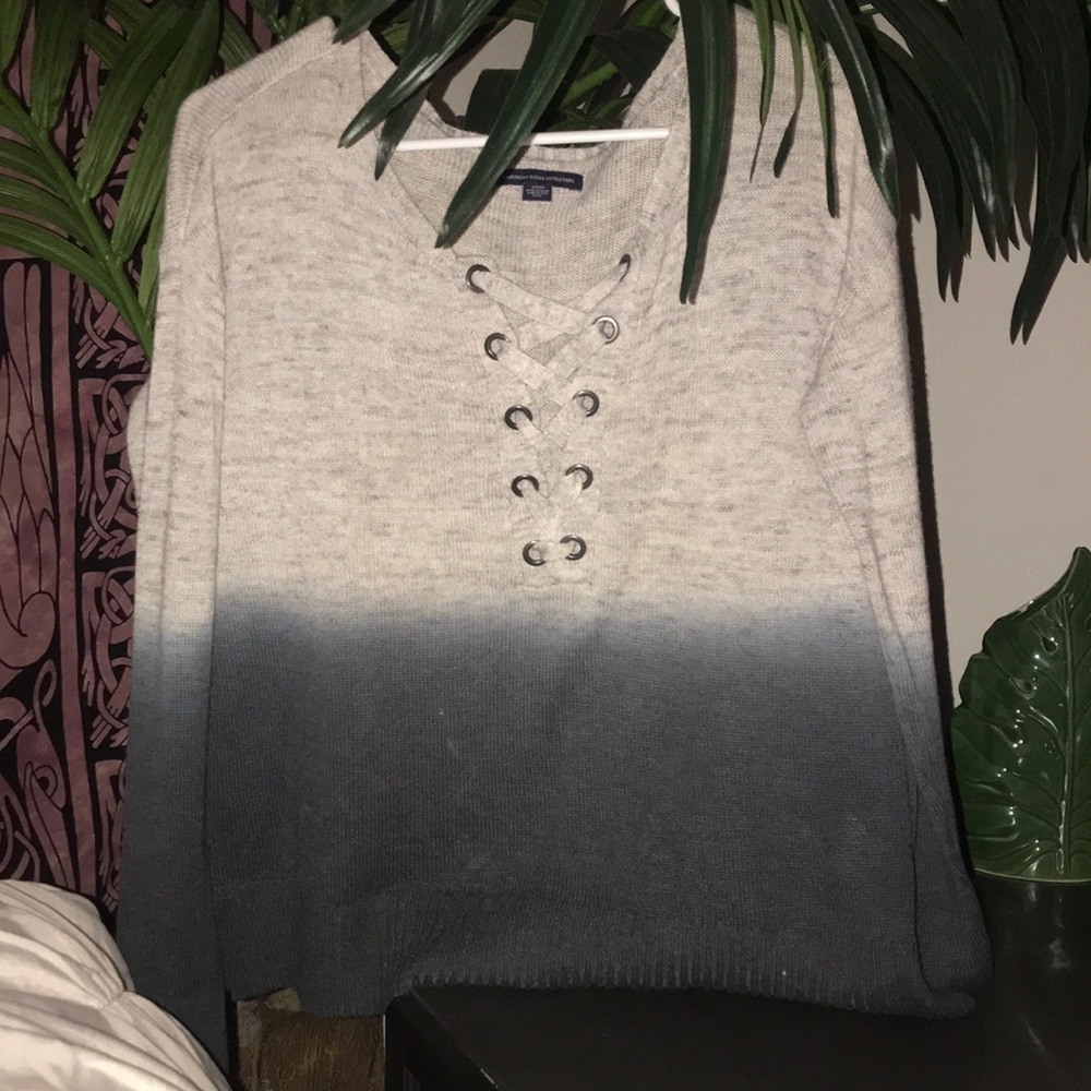 Grey sweater fade with string tie in front